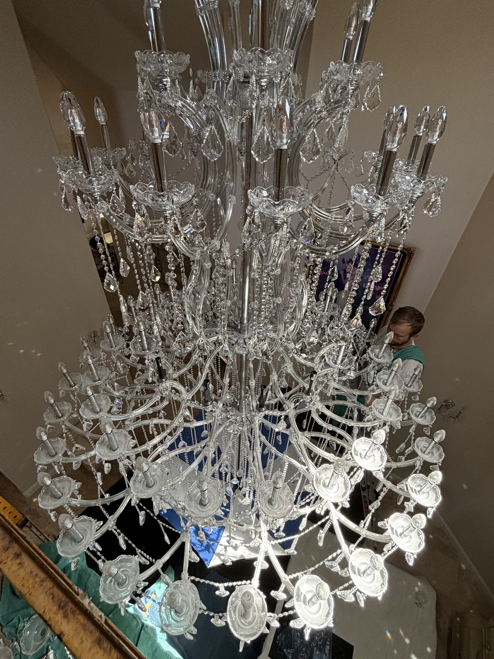 Swarovski crystal chandelier bobeches packed with concrete dust before cleaning