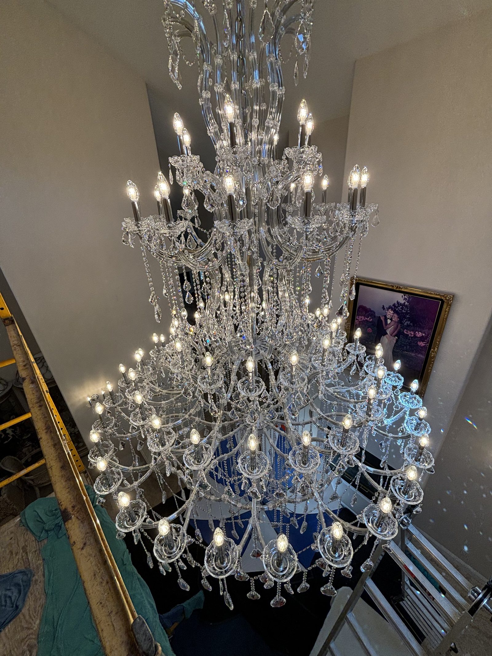 Hand-cleaning Swarovski crystal strands with microfiber towels