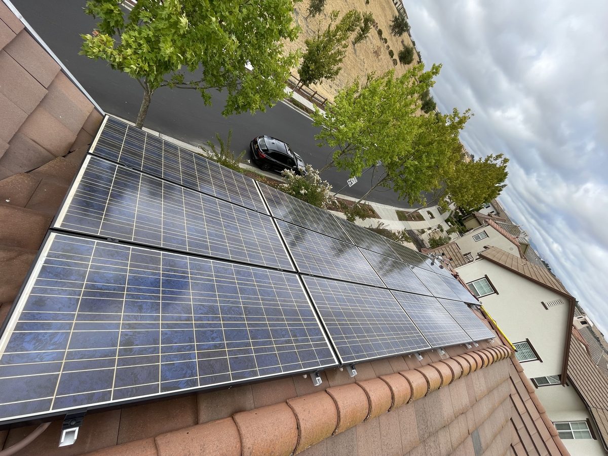 Solar panels on roof being cleaned